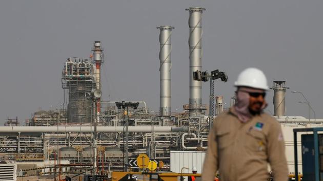 An employee looks on at a Saudi Aramco oil facility in Abqaiq, Saudi Arabia. (REUTERS)