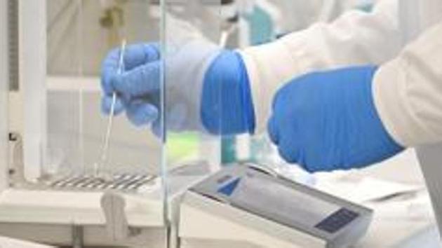 A chemist works at AstraZeneca's headquarters.(REUTERS) A chemist works at AstraZeneca's headquarters.(REUTERS)