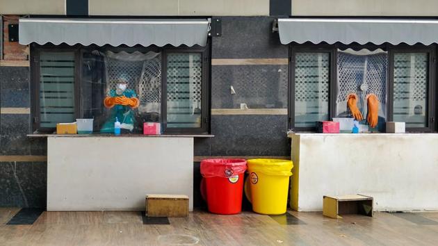 A health worker wearing PPE coveralls seen inside an enclosed kiosk at AIIMS (All India Institute of Medical Sciences) in New Delhi on September 8. The Delhi government commissioned a record 54,517 tests for coronavirus disease on a day which led to the registration of 4,039 new cases in the city on September 9. (Amal KS / HT Photo) A health worker wearing PPE coveralls seen inside an enclosed kiosk at AIIMS (All India Institute of Medical Sciences) in New Delhi on September 8. The Delhi government commissioned a record 54,517 tests for coronavirus disease on a day which led to the registration of 4,039 new cases in the city on September 9. (Amal KS / HT Photo)