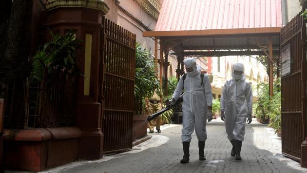 West Bengal Fire and Emergency Services staff in PPE coveralls sanitise the Calcutta High Court building in Kolkata on September 7. There were 89,706 infections reported on September 8, taking India’s Covid-19 tally to 43,70,128 according to the Health Ministry’s bulletin. (Samir Jana / HT Photo) West Bengal Fire and Emergency Services staff in PPE coveralls sanitise the Calcutta High Court building in Kolkata on September 7. There were 89,706 infections reported on September 8, taking India’s Covid-19 tally to 43,70,128 according to the Health Ministry’s bulletin. (Samir Jana / HT Photo)