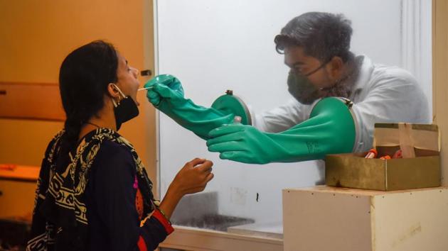 A health worker conducts a swab test at SNDT College in Pune on September 8. A total of 11,54,549 samples were tested for Covid-19 infection on September 8. The cumulative testing figure for the virus in the country has reached 5,18,04,677 samples. (Sanket Wankhede / HT Photo) A health worker conducts a swab test at SNDT College in Pune on September 8. A total of 11,54,549 samples were tested for Covid-19 infection on September 8. The cumulative testing figure for the virus in the country has reached 5,18,04,677 samples. (Sanket Wankhede / HT Photo)