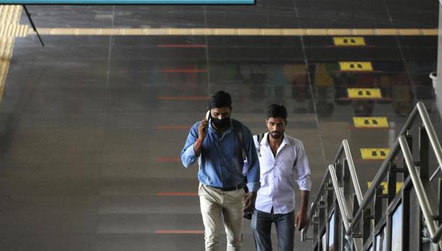 Commuters seen inside Sector 51 metro Station in Noida, Uttar Pradesh. (HT photo) Commuters seen inside Sector 51 metro Station in Noida, Uttar Pradesh. (HT photo)