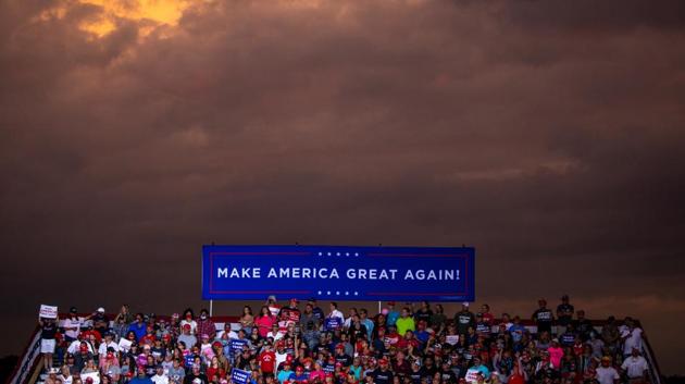 Attendees listen during a campaign rally for US President Donald Trump in Winston-Salem, North Carolina, US (Bloomberg) Attendees listen during a campaign rally for US President Donald Trump in Winston-Salem, North Carolina, US (Bloomberg)