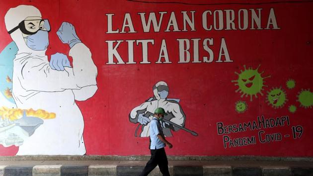 Indonesia on Tuesday surpassed 200,000 cases of the coronavirus, the second-highest tally in Southeast Asia after the Philippines, which has reported more than 241,000 infections. (AP Photo) Indonesia on Tuesday surpassed 200,000 cases of the coronavirus, the second-highest tally in Southeast Asia after the Philippines, which has reported more than 241,000 infections. (AP Photo)