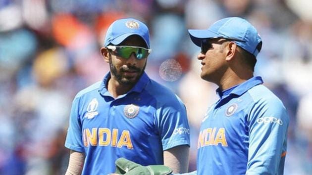 India's Jasprit Bumrah, left, listens to Mahendra Singh Dhoni during the Cricket World Cup match between India and Sri Lanka at Headingley in Leeds, England, Saturday, July 6, 2019. (AP) India's Jasprit Bumrah, left, listens to Mahendra Singh Dhoni during the Cricket World Cup match between India and Sri Lanka at Headingley in Leeds, England, Saturday, July 6, 2019. (AP)