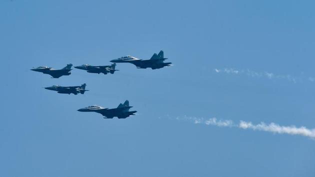 Air display of the first batch of IAF’s Rafale aircraft in an arrow formation followed by Jaguar and SU-30 aircraft during the former’s induction ceremony. Five Rafale fighter aircrafts were formally inducted into the Indian Air Force’s 17 Squadron ‘Golden Arrows’. (PTI Photo)