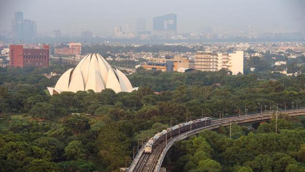 A Violet Line metro train passes by Lotus Temple as services resume under Unlock 4 guidelines in New Delhi on September 10. Delhi on September 9 reported over 4,000 cases of Covid-19 infection for the first time since the outbreak --taking the capital’s tally past 200,000 and making it the only city in India to breach this mark. (Amal KS / HT Photo) A Violet Line metro train passes by Lotus Temple as services resume under Unlock 4 guidelines in New Delhi on September 10. Delhi on September 9 reported over 4,000 cases of Covid-19 infection for the first time since the outbreak --taking the capital’s tally past 200,000 and making it the only city in India to breach this mark. (Amal KS / HT Photo)