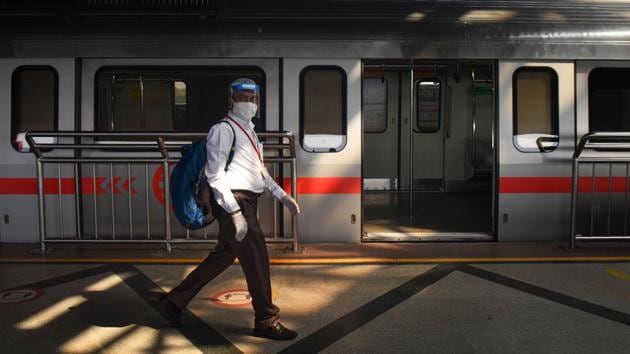 A commuter wearing a face shield while travelling on the Delhi Metro at Kashmiri Gate Metro Station on September 10. Delhi’s hospitalisations and deaths from the virus are also fewer as compared to June. There were 5,775 patients with Covid-19 admitted to hospitals across the city, according to the September 10 report. In contrast, 6,264 were hospitalised as on June 23, as per government data. (Sanchit Khanna / HT Photo) A commuter wearing a face shield while travelling on the Delhi Metro at Kashmiri Gate Metro Station on September 10. Delhi’s hospitalisations and deaths from the virus are also fewer as compared to June. There were 5,775 patients with Covid-19 admitted to hospitals across the city, according to the September 10 report. In contrast, 6,264 were hospitalised as on June 23, as per government data. (Sanchit Khanna / HT Photo)