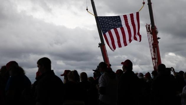 An American Flag hangs on display ahead a campaign rally with U.S. President Donald Trump in Freeland, Michigan, US (Bloomberg) An American Flag hangs on display ahead a campaign rally with U.S. President Donald Trump in Freeland, Michigan, US (Bloomberg)