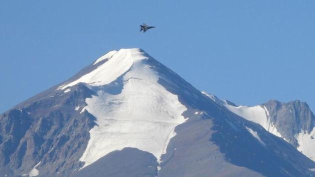 An Indian Air Force fighter plane flies over a mountain range in Leh, Ladakh on September 9. India and China framed a five-point roadmap for easing tensions on LAC and speeding up the disengagement of troops during talks between external affairs minister S Jaishankar and his Chinese counterpart Wang Yi on the margins of a Shanghai Cooperation Organisation (SCO) meeting in Moscow on September 10. (REUTERS) An Indian Air Force fighter plane flies over a mountain range in Leh, Ladakh on September 9. India and China framed a five-point roadmap for easing tensions on LAC and speeding up the disengagement of troops during talks between external affairs minister S Jaishankar and his Chinese counterpart Wang Yi on the margins of a Shanghai Cooperation Organisation (SCO) meeting in Moscow on September 10. (REUTERS)