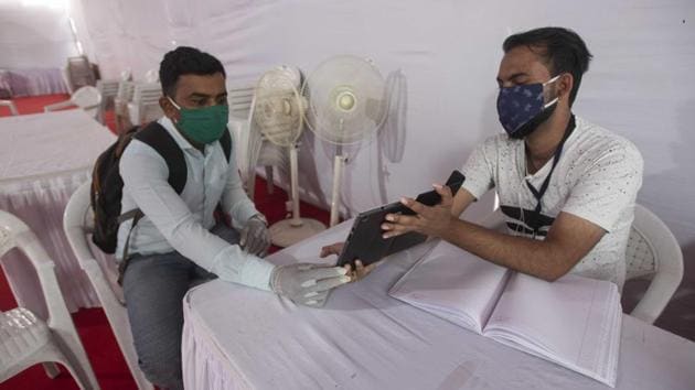 A relative interacts with a Covid-19 patient using a tablet phone at Jumbo Covid Care facility in COEP ground, Pune on September 9. Maharashtra also accounts for the highest number of deaths in the country — 29,115, HT reported. (Pratham Gokhale / HT Photo) A relative interacts with a Covid-19 patient using a tablet phone at Jumbo Covid Care facility in COEP ground, Pune on September 9. Maharashtra also accounts for the highest number of deaths in the country — 29,115, HT reported. (Pratham Gokhale / HT Photo)