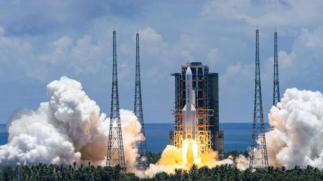 A Long March-5 rocket carrying the Tianwen-1 Mars probe lifts off from the Wenchang Space Launch Center in southern China's Hainan Province. (AP) A Long March-5 rocket carrying the Tianwen-1 Mars probe lifts off from the Wenchang Space Launch Center in southern China's Hainan Province. (AP)