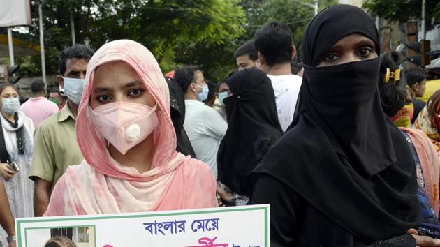 Congress activists take part in a demonstration to protest against the arrest of actress Rhea Chakraborty, in Kolkata on Saturday. (ANI) Congress activists take part in a demonstration to protest against the arrest of actress Rhea Chakraborty, in Kolkata on Saturday. (ANI)