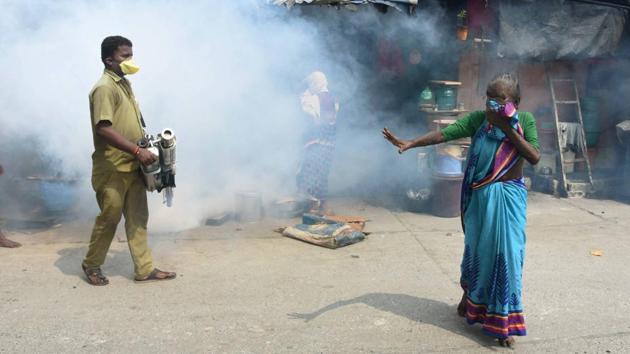 A BMC worker carries out fumigation works as part of preventive measures against malaria at Reay Road area in Mumbai on September 11. The country has been adding upwards of 90,000 cases and over 1100 deaths daily in recent days. 97,570 infections were reported on September 11, data from the Union Health Ministry shows. (PTI) A BMC worker carries out fumigation works as part of preventive measures against malaria at Reay Road area in Mumbai on September 11. The country has been adding upwards of 90,000 cases and over 1100 deaths daily in recent days. 97,570 infections were reported on September 11, data from the Union Health Ministry shows. (PTI)