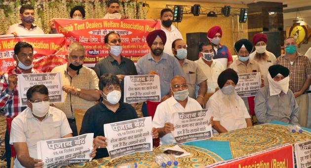 Tent dealers and caterers addressing the mediapersons regarding their protest in Ludhiana on Saturday. (Gurpreet Singh/HT) Tent dealers and caterers addressing the mediapersons regarding their protest in Ludhiana on Saturday. (Gurpreet Singh/HT)