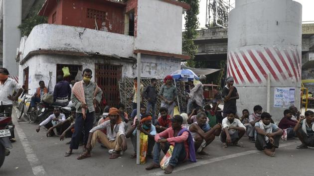 Labours sitting near the corner of road at Nishatganj, Lucknow, Uttar Pradesh,(HT Photo/Dheeraj Dhawan)