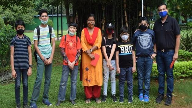 Chinmay Siddharth Shah, 12, handed over a cheque of Rs 25,000 to a zoo official for the adoption of the tiger for three months.(ANI)