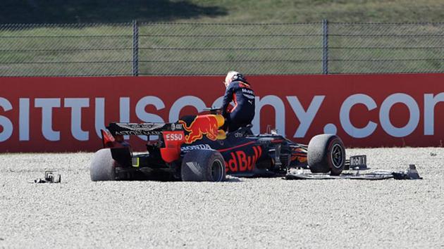 Max Verstappen of Netherlands and Red Bull Racing climbs out of his car after a collision during the F1 Grand Prix of Tuscany(Getty Images)