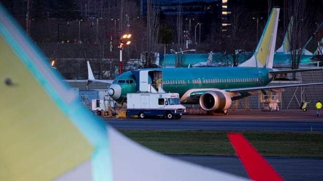A service truck is seen stopped next to a Boeing 737 Max aircraft in storage at the Renton Municipal Airport in Renton, Washington.(REUTERS) A service truck is seen stopped next to a Boeing 737 Max aircraft in storage at the Renton Municipal Airport in Renton, Washington.(REUTERS)
