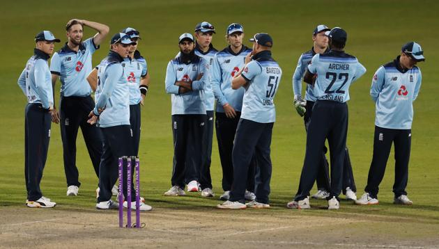 Cricket - Second One Day International - England v Australia - Emirates Old Trafford, Manchester - September 13, 2020 England players celebrate the wicket of Australia's Marnus Labuschagne Pool via REUTERS/Martin Rickett (Pool via REUTERS)
