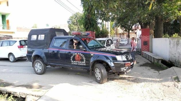 A police vehicle on the premises of former minister Choudhary Lal Singh in Kathua on Tuesday.(Sourced)