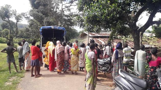 The village people gathered at the crime scene in Jharkhand’s Gumla. (HT Photo)