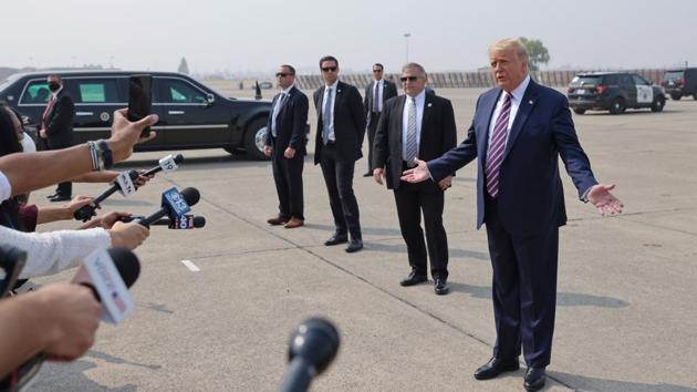 US President Donald Trump speaks to reporters after arriving in McClellan Park, California, US (REUTERS) US President Donald Trump speaks to reporters after arriving in McClellan Park, California, US (REUTERS)