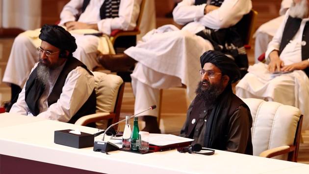Mullah Abdul Ghani Baradar, the leader of the Taliban delegation, speaks during talks between the Afghan government and Taliban insurgents in Doha, Qatar on Sunday(REUTERS)