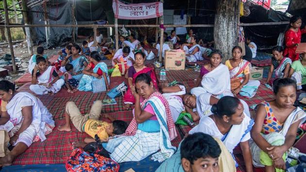 Residents of Baghjan demonstrate outside the Deputy Commissioner’s office during a meeting with officials in Tinsukia on September 11. Kajoli Hazarika, whose house is just about 200 metres from well no. 5 that caught fire, told PTI that the area has also been experiencing frequent tremors since the blowout in June. (Manish Sharma / PTI)