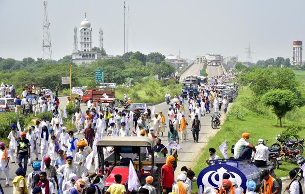 Farmers blocking the Beas bridge during a protest at Beas in Amritsar district on Monday. Farmers blocking the Beas bridge during a protest at Beas in Amritsar district on Monday.