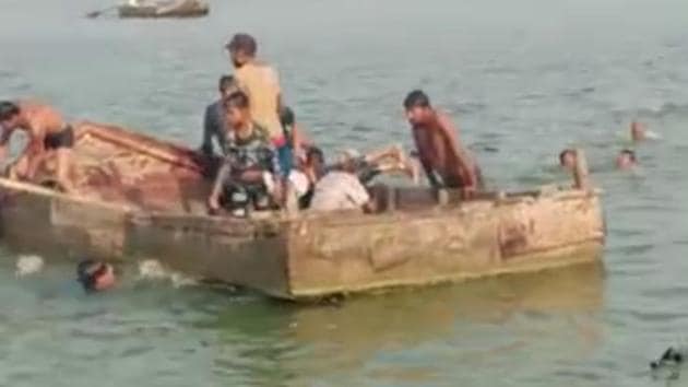 The boat carrying over three dozen villagers capsized in Chambal river in Khatoli region of Kota district on Wednesday morning. (HT photo)