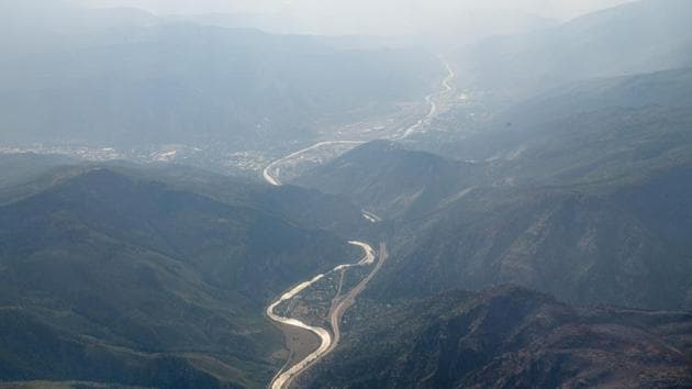 The Colorado River divides Glenwood Canyon slurry and a burn scar on the ridge from the Grizzly Creek Fire.(AP) The Colorado River divides Glenwood Canyon slurry and a burn scar on the ridge from the Grizzly Creek Fire.(AP)