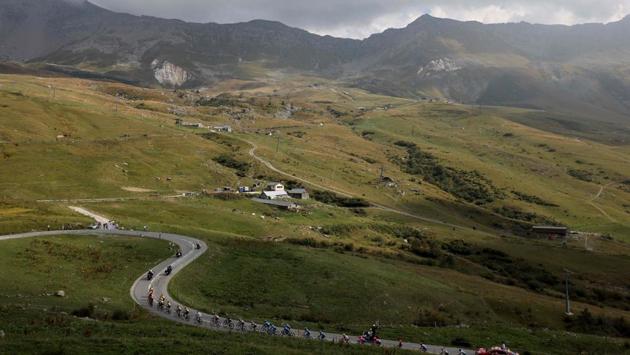 A total of 22 teams have entered the race this year which is spread through 3,484 kilometers in some of the most alluring vistas in France. (Kenzo Tribouillard / AFP)