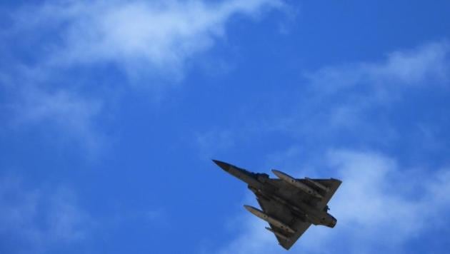 An Indian Air Force fighter jet flies over Leh on Wednesday. (AFP)