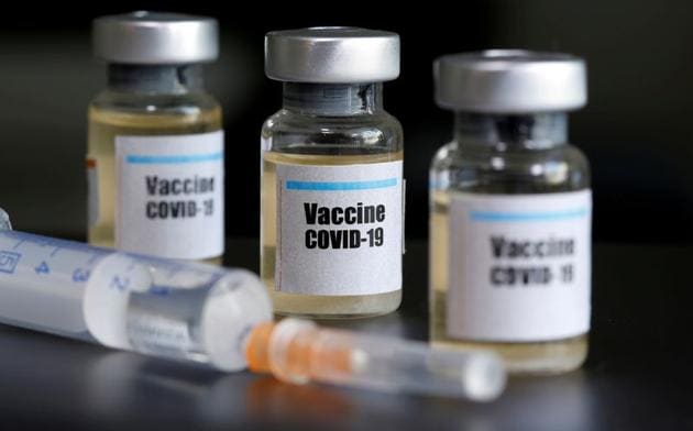 FILE PHOTO: Small bottles labeled with a "Vaccine COVID-19" sticker and a medical syringe are seen in this illustration taken April 10, 2020.(REUTERS)
