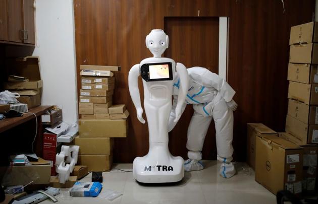 A medical worker puts 'Mitra' on charge at the Yatharth Super Speciality Hospital in Noida, on the outskirts of New Delhi, India, September 15, 2020. (REUTERS)