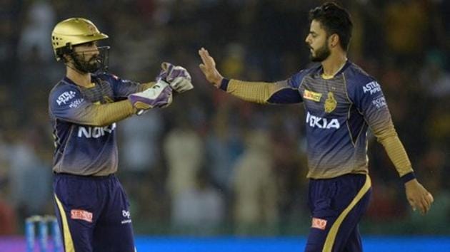 Nitish Rana celebrates a wicket with his KKR captain Dinesh Karthik(Getty Images)