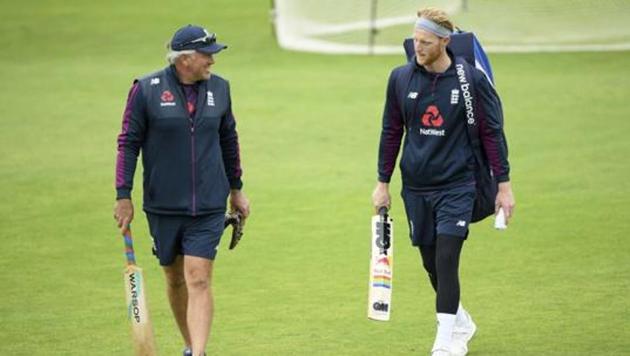 Ben Stokes, right, speaks with coach Chris Silverwood during a nets session at the Ageas Bowl in Southampton.(AP)