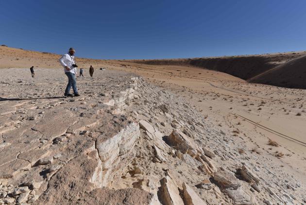 A detailed scene was reconstructed by researchers in a new study published in Science Advances on September 16, 2020, following the discovery of ancient human and animal footprints in the Nefud Desert that shed new light on the routes our ancient ancestors took as they spread out of Africa. (Photo by Badar ZAHRANI / Badar ZAHRANI / AFP)