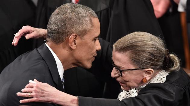 US President Barack Obama is greeted by Supreme Court Justice Ruth Bader Ginsburg upon his arrival to deliver the State of the Union address at the US Capitol in Washington on January 12, 2016. Ginsburg released her first book “My Own Words” in 2016. (Nicholas Kamm / AFP) 