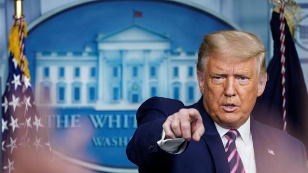 Asked by reporters if he wanted to fire Wray, Trump said: “We’re looking at a lot of different things.” (Reuters Photo) Asked by reporters if he wanted to fire Wray, Trump said: “We’re looking at a lot of different things.” (Reuters Photo)