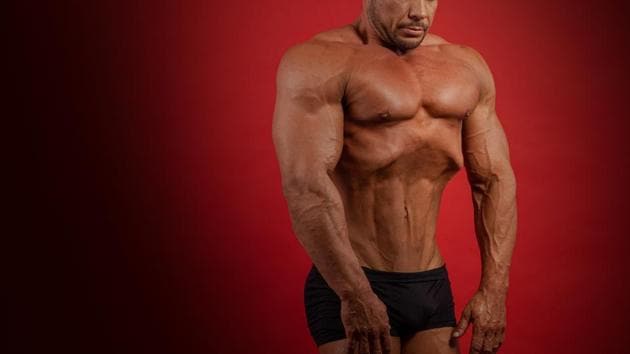 How did most classic bodybuilders have or maintain slim waists