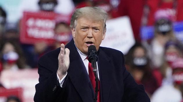 President Donald Trump speaks at a campaign rally at the Fayetteville Regional Airport in Fayetteville, NC. (AP) President Donald Trump speaks at a campaign rally at the Fayetteville Regional Airport in Fayetteville, NC. (AP)