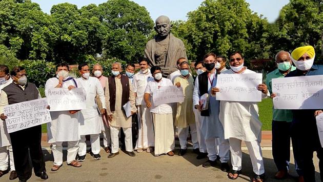 Rajya Sabha MPs from opposition parties protest outside the Parliament on September 20 after the Rajya Sabha passed the Farmers’ and Produce Trade & Commerce (Promotion & Facilitation) Bill, 2020 and the Farmers (Empowerment & Protection) Agreement on Price Assurance & Farm Services Bill, 2020. (ANI) Rajya Sabha MPs from opposition parties protest outside the Parliament on September 20 after the Rajya Sabha passed the Farmers’ and Produce Trade & Commerce (Promotion & Facilitation) Bill, 2020 and the Farmers (Empowerment & Protection) Agreement on Price Assurance & Farm Services Bill, 2020. (ANI)