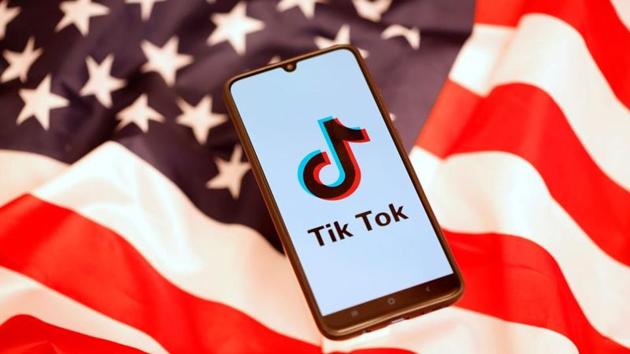 TikTok logo is displayed on the smartphone while standing on the US flag in this illustration picture. (Reuters file) TikTok logo is displayed on the smartphone while standing on the US flag in this illustration picture. (Reuters file)
