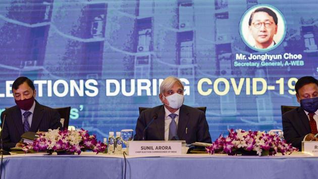 Chief Election Commissioner of India Sunil Arora (C), Election Commissioner of India Rajeev Kumar (R), and Sushil Chandra during the International Webinar on 'Issues, Challenges and Protocols for Conducting Elections during Covid-19’ in New Delhi. (PTI)