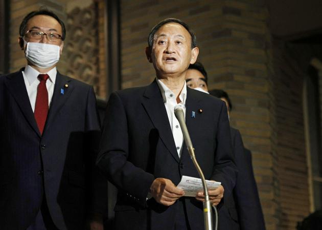 Japanese Prime Minister Yoshihide Suga meets the press at the prime minister's official residence after speaking on the phone with U.S. President Donald Trump at their first conversation since Suga took office, in Tokyo, Japan (Kyodo/via REUTERS)