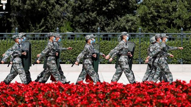 Soldiers of the People's Liberation Army (PLA) march outside the Great Hall of the People in Beijing, China on September 8.(REUTERS)