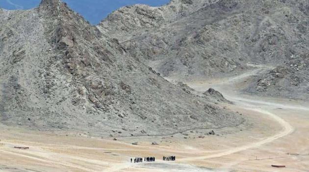 Indian soldiers walk at the foothills of a mountain range near Leh, the joint capital of the union territory of Ladakh, on June 24, 2020.(AFP file photo)