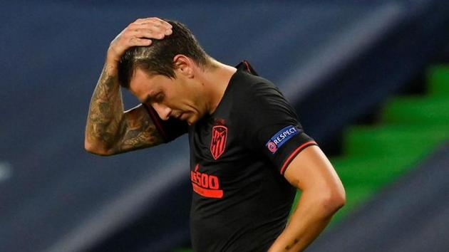 Soccer Football - Champions League - Quarter Final - RB Leipzig v Atletico Madrid - Estadio Jose Alvalade, Lisbon, Portugal - August 13, 2020 Atletico Madrid's Jose Gimenez looks dejected after the match, as play resumes behind closed doors following the outbreak of the coronavirus disease (COVID-19) Lluis Gene/Pool via REUTERS(REUTERS)